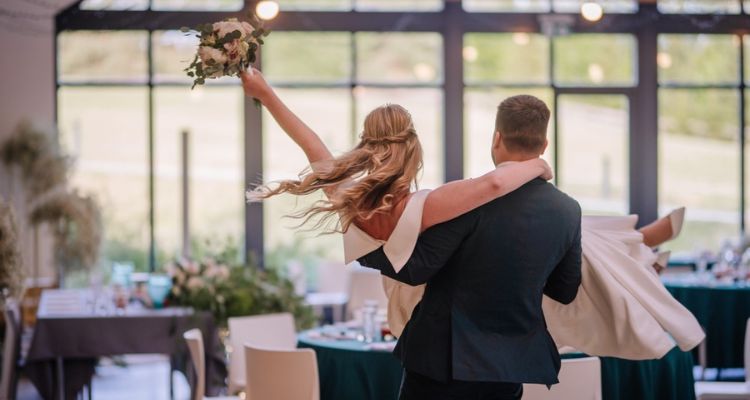 a bride and groom at th recfeption of their wedding